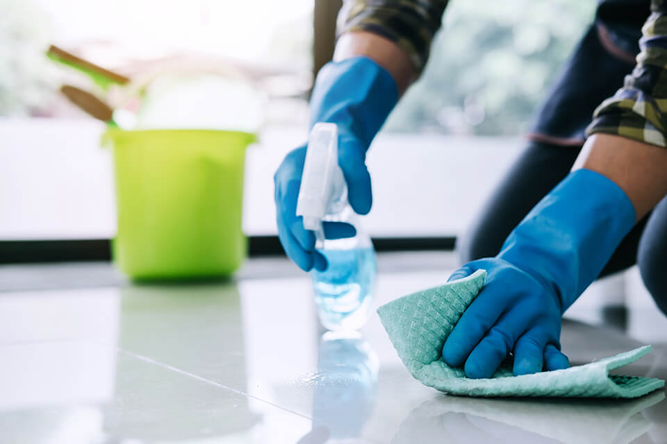 A person cleaning the floors