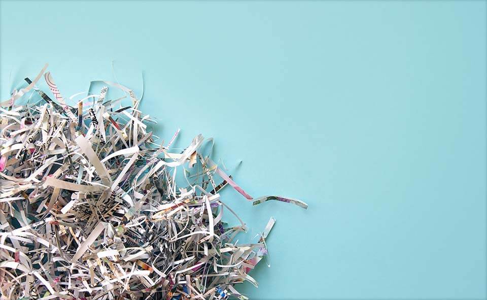 Shredded pieces on the blue surface
