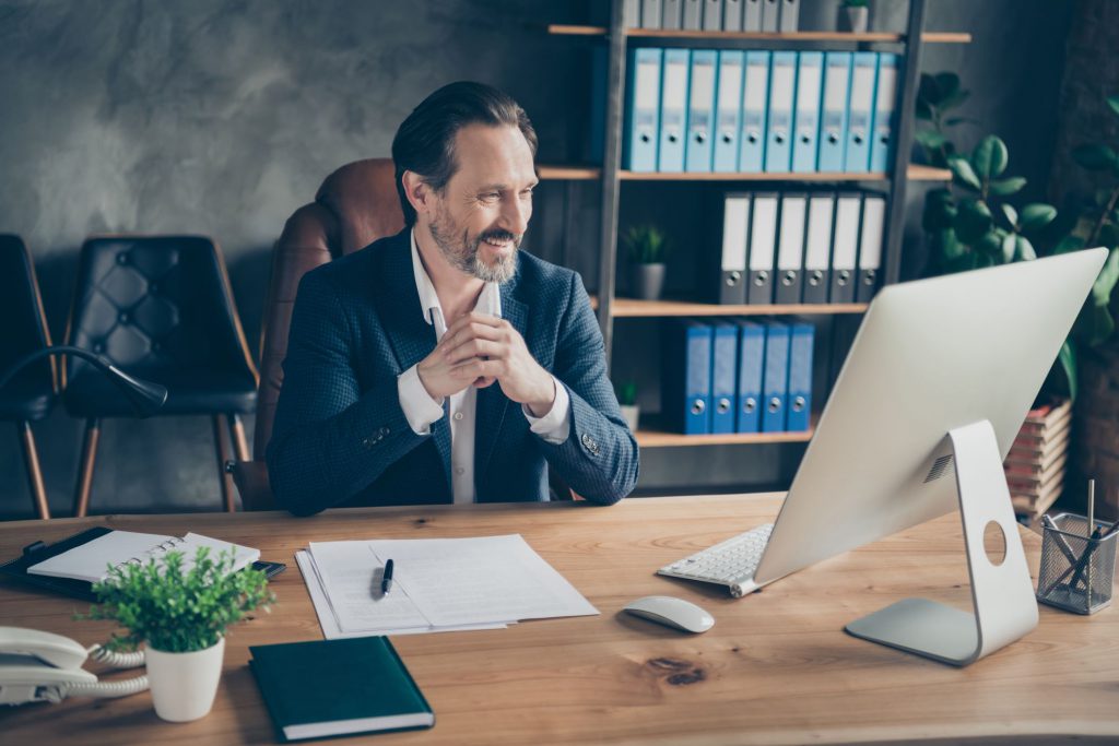 Guy in a better office as one of the benefits of moving