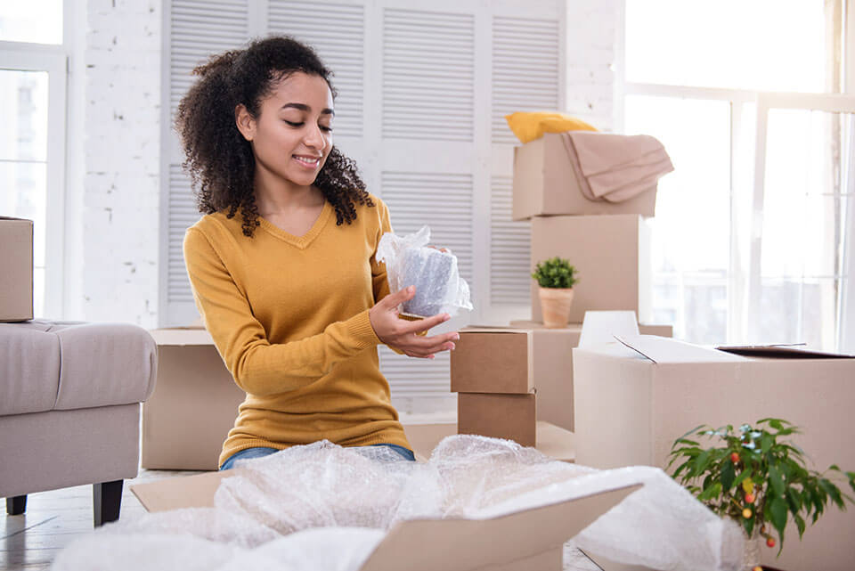 Girl holding a mug in a bubble package