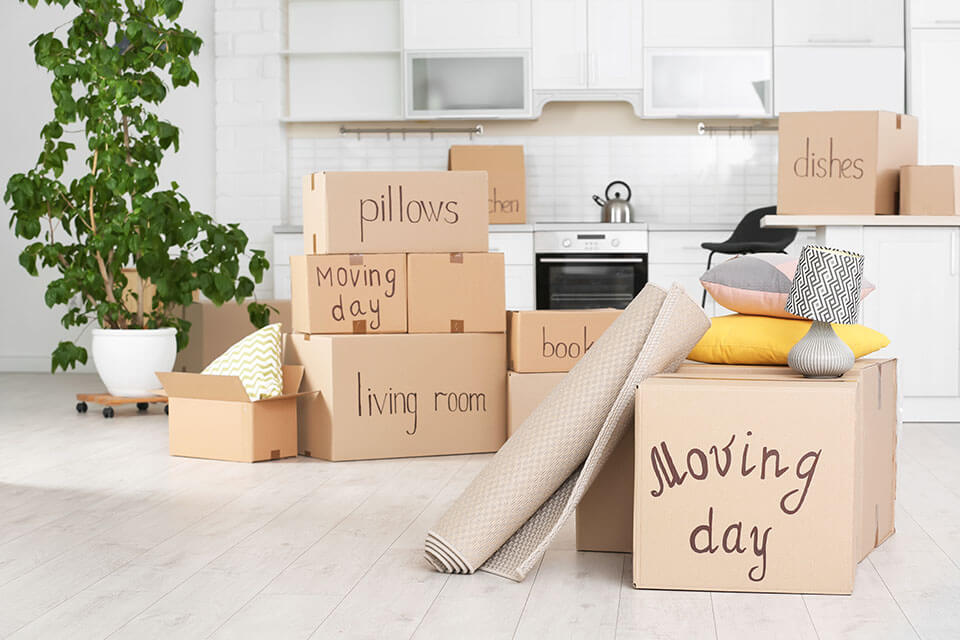 Labeled packages in the kitchen waiting for local movers in Chicago to pick them up
