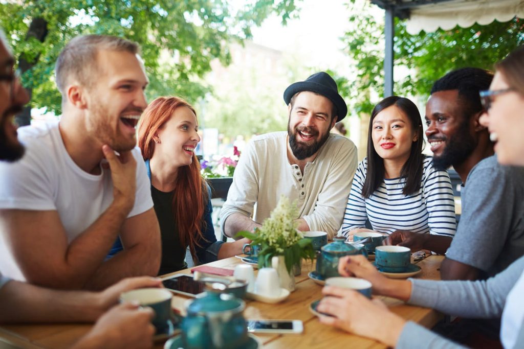 A group of people having drinks together