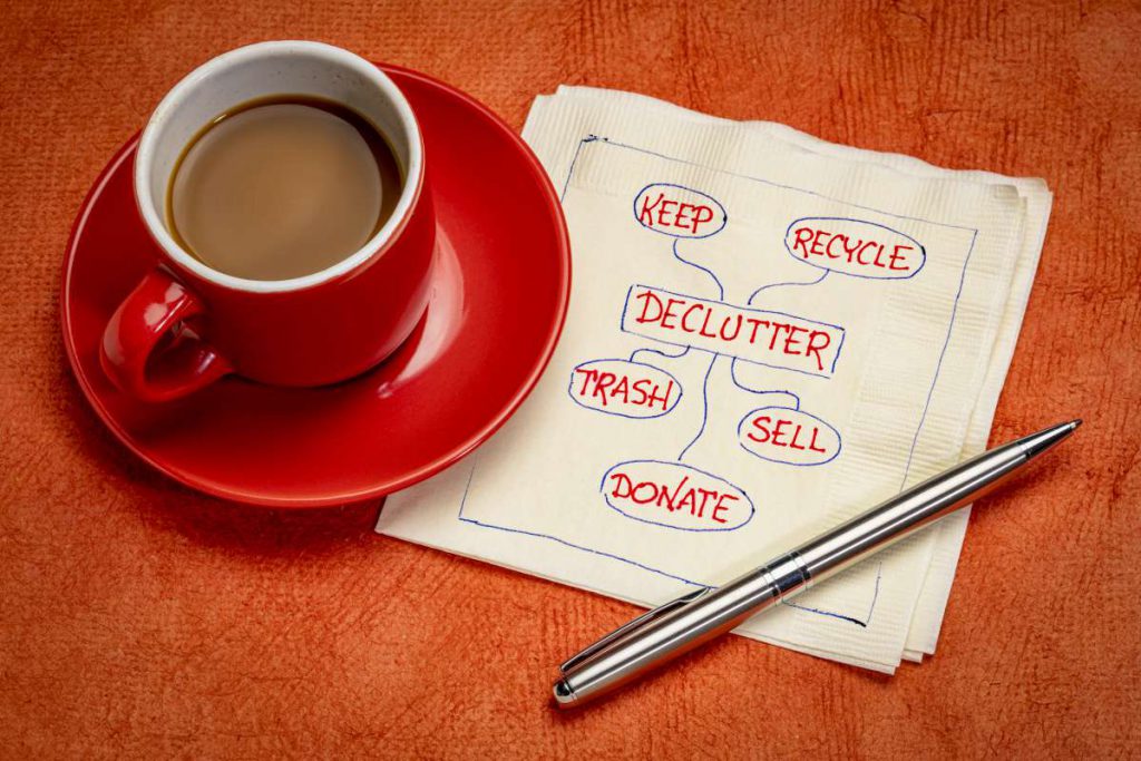 Coffee, pen, and a napkin that's written on