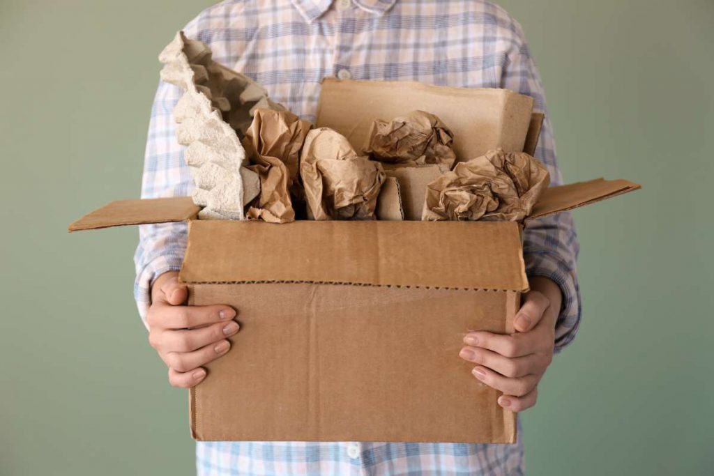 Person holding materials