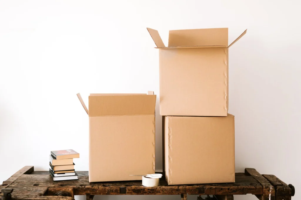 Three boxes on a wooden desk